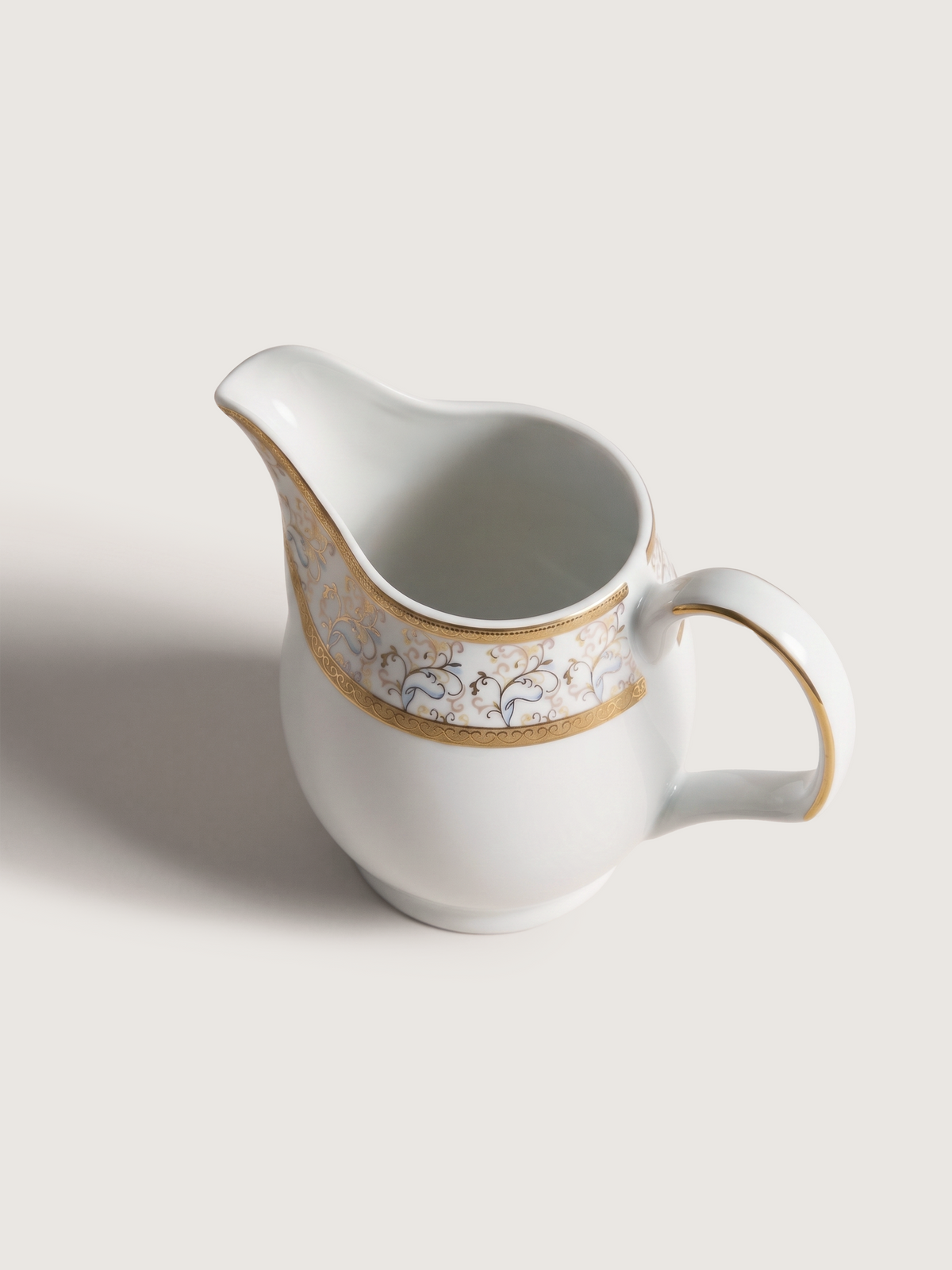 Teapot in Porcelain with Milk Jug, Rounded Shape and Floral Gold Decoration