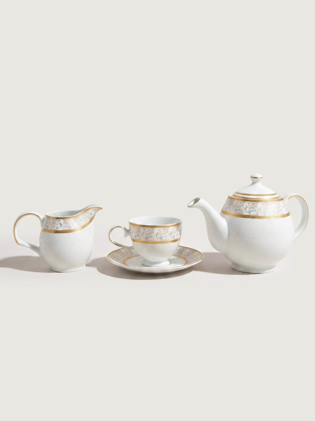 Teapot in Porcelain with Milk Jug, Rounded Shape and Floral Gold Decoration
