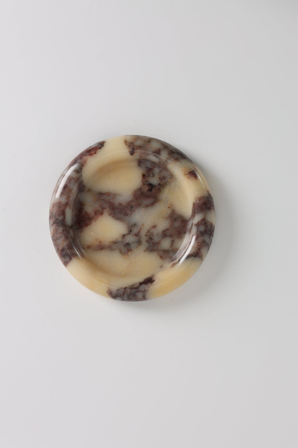 Tray in Natural Stone, Round and Polished with a Raised Rim