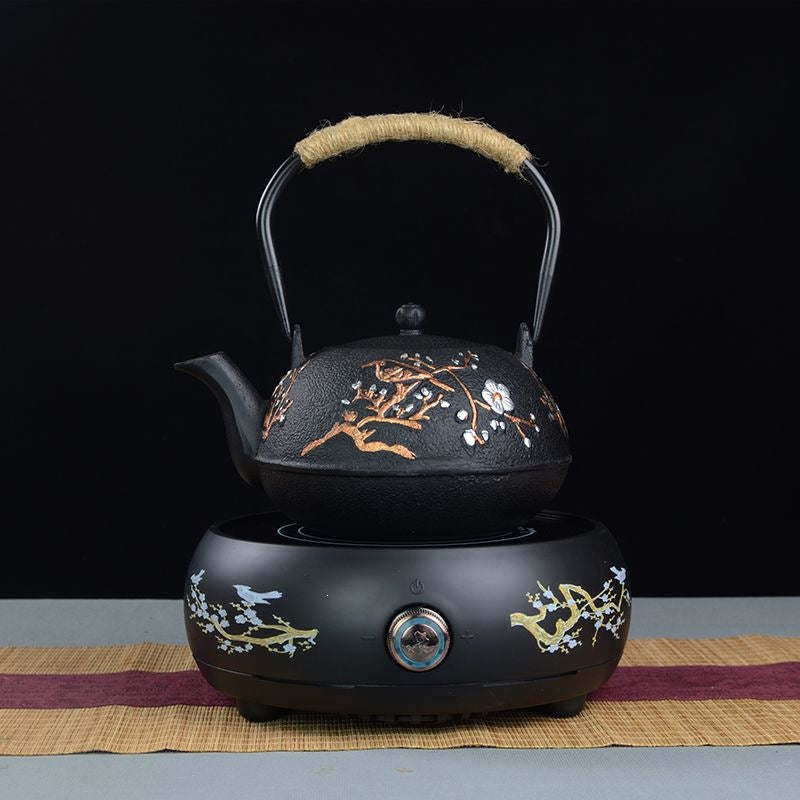 Cast Iron Teapot Set with Floral Relief and Ceramic Hotplate, for Tea Preparation