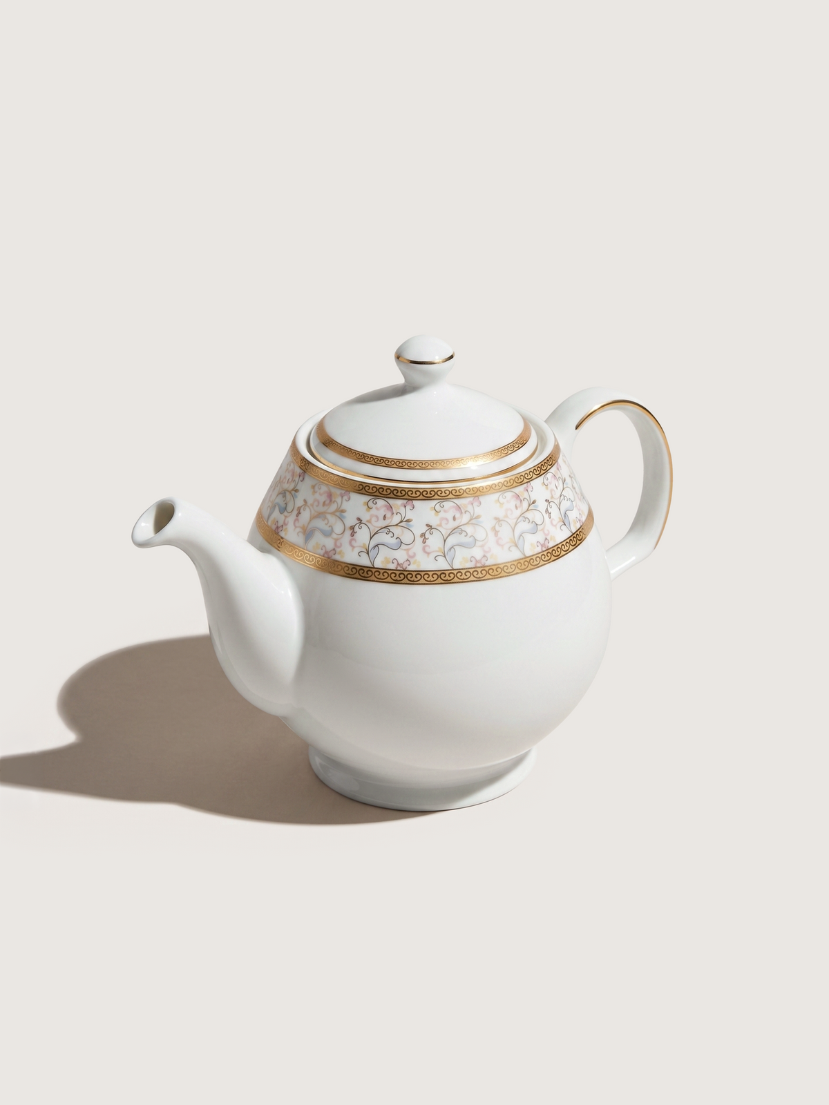 Teapot in Porcelain with Milk Jug, Rounded Shape and Floral Gold Decoration