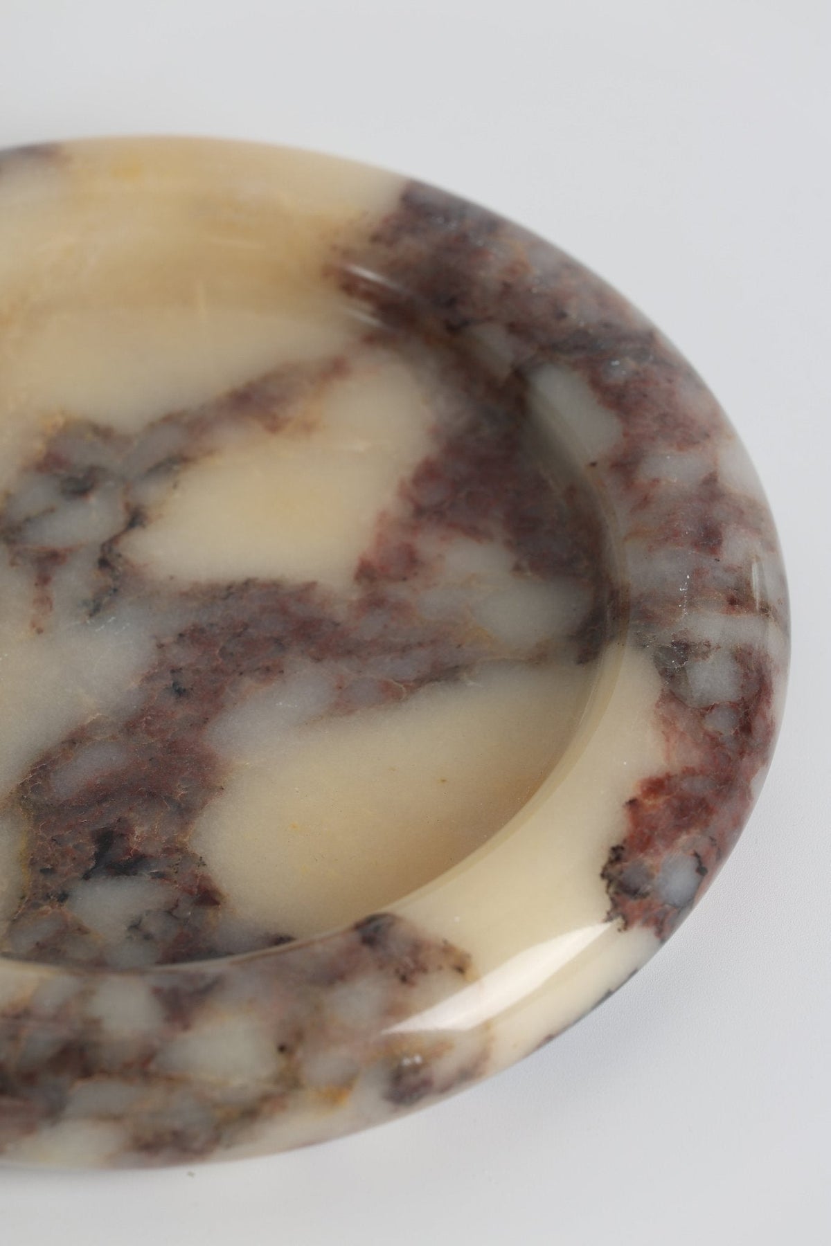Tray in Natural Stone, Round and Polished with a Raised Rim